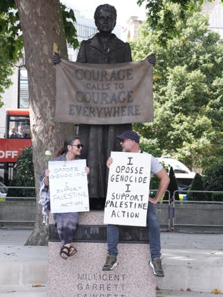 People have gathered to protest the ban on the group Palestine Action